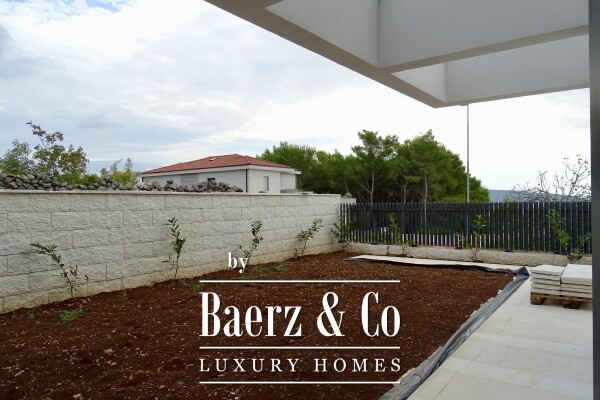 photo 2 Krk, a three, bedroom apartment with a living area 120 m², garden, and basement